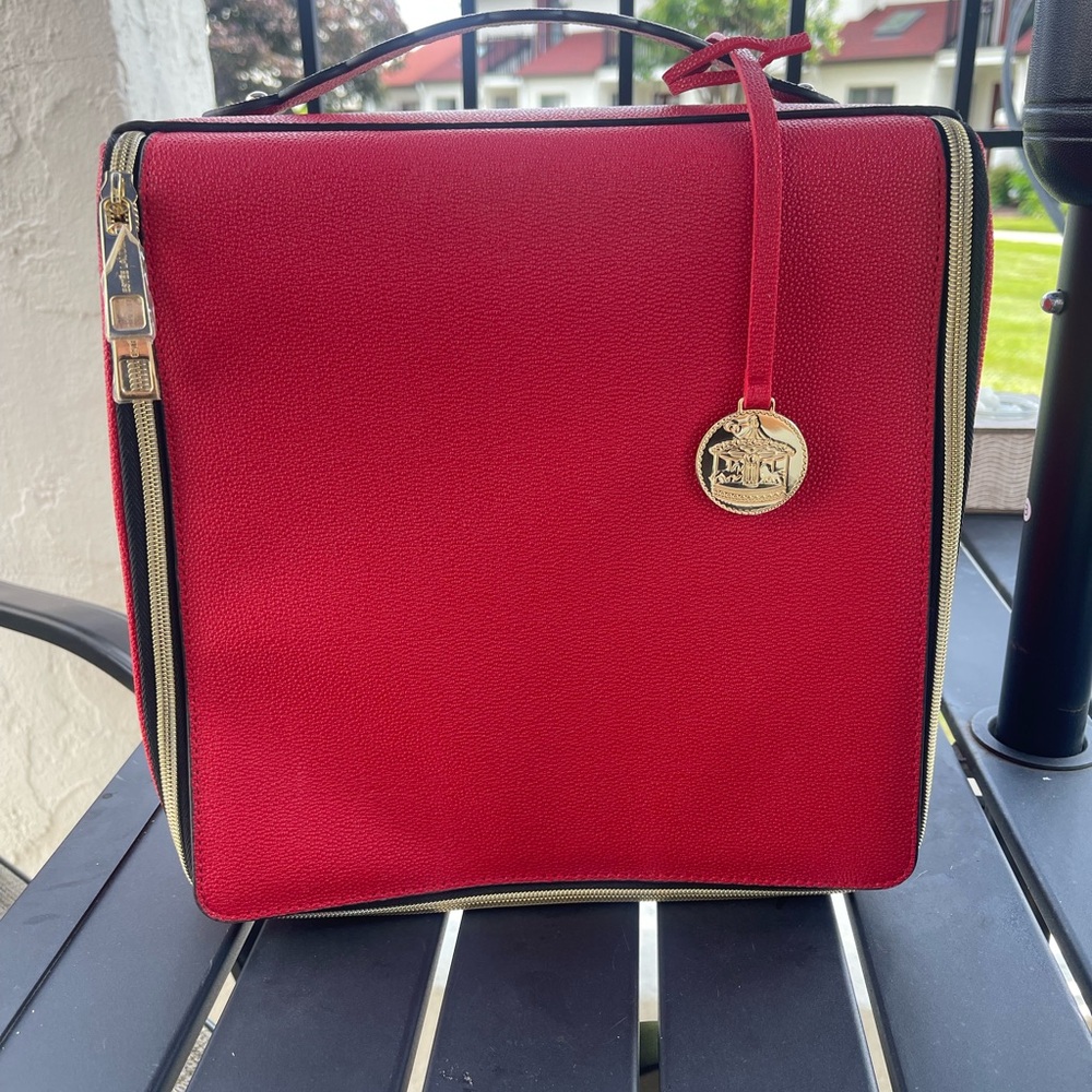 Estee Lauder Red Travel Bag with Sleek Design